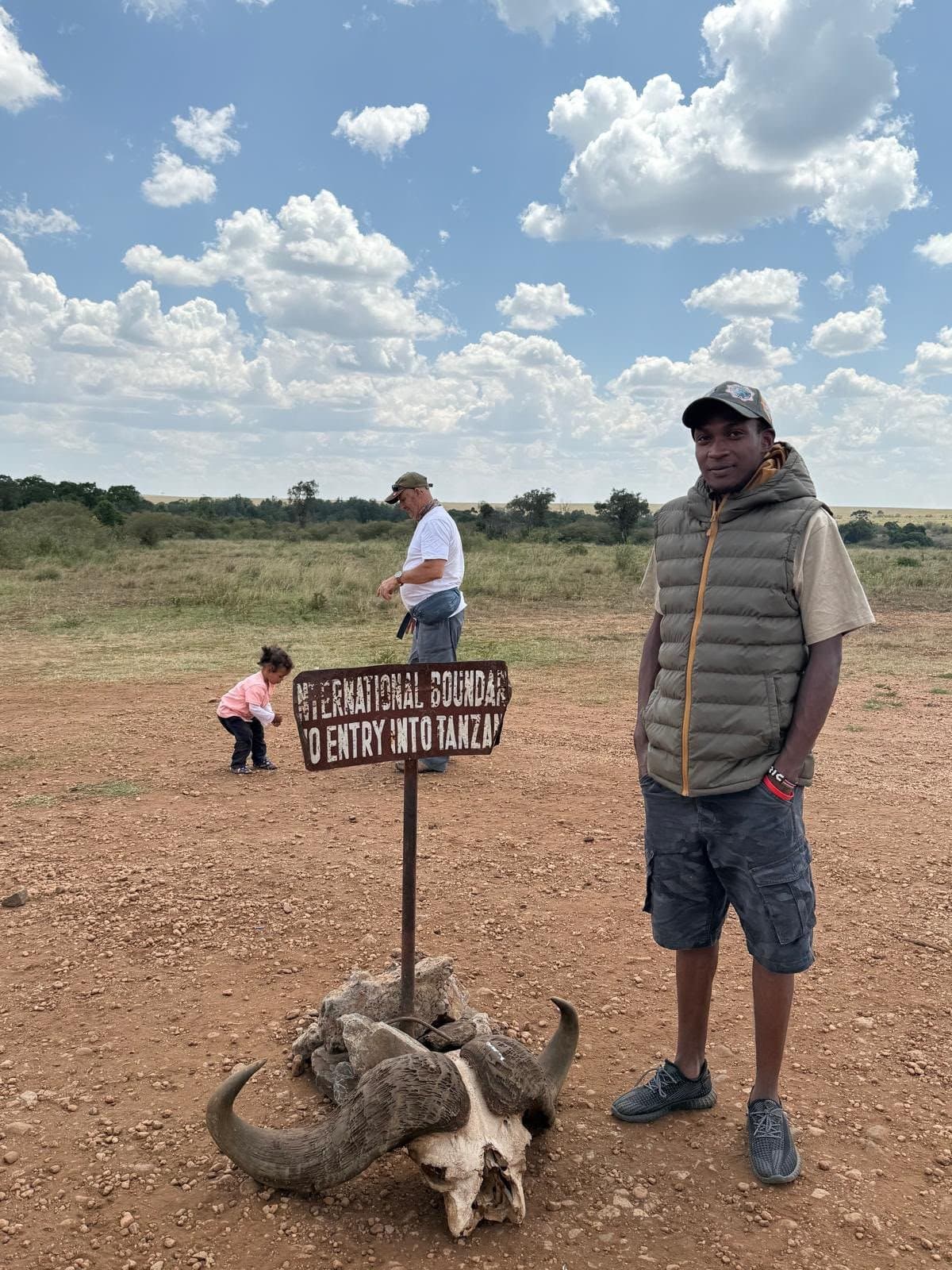 At the Kenya–Tanzania boundary marker deep in the Masai Mara
